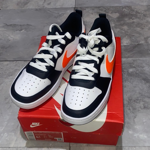 Nike big kid 4.5Y women 6 Sneakers in Black White and Orange court borough low